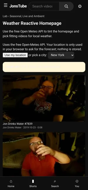 On a phone, the weather reactive homepage experiment, tinting the page to the local weather and picking matching videos